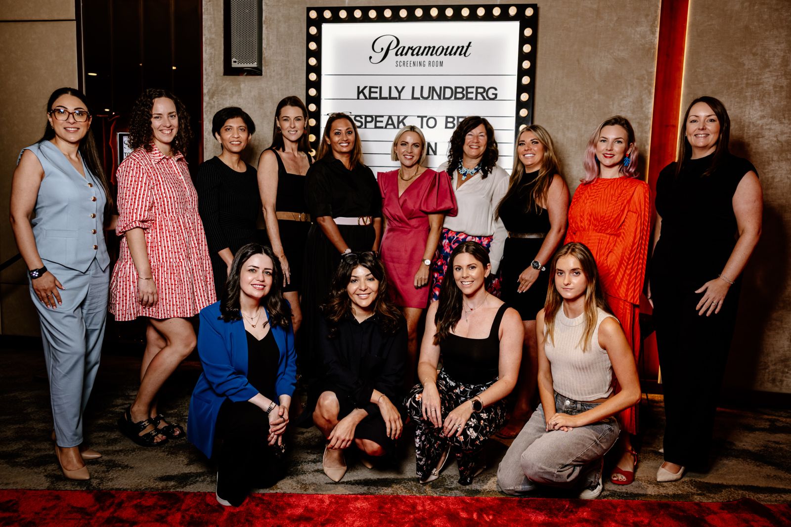 Kelly Lundberg with members at a curated stage event in the Paramount Screening Room